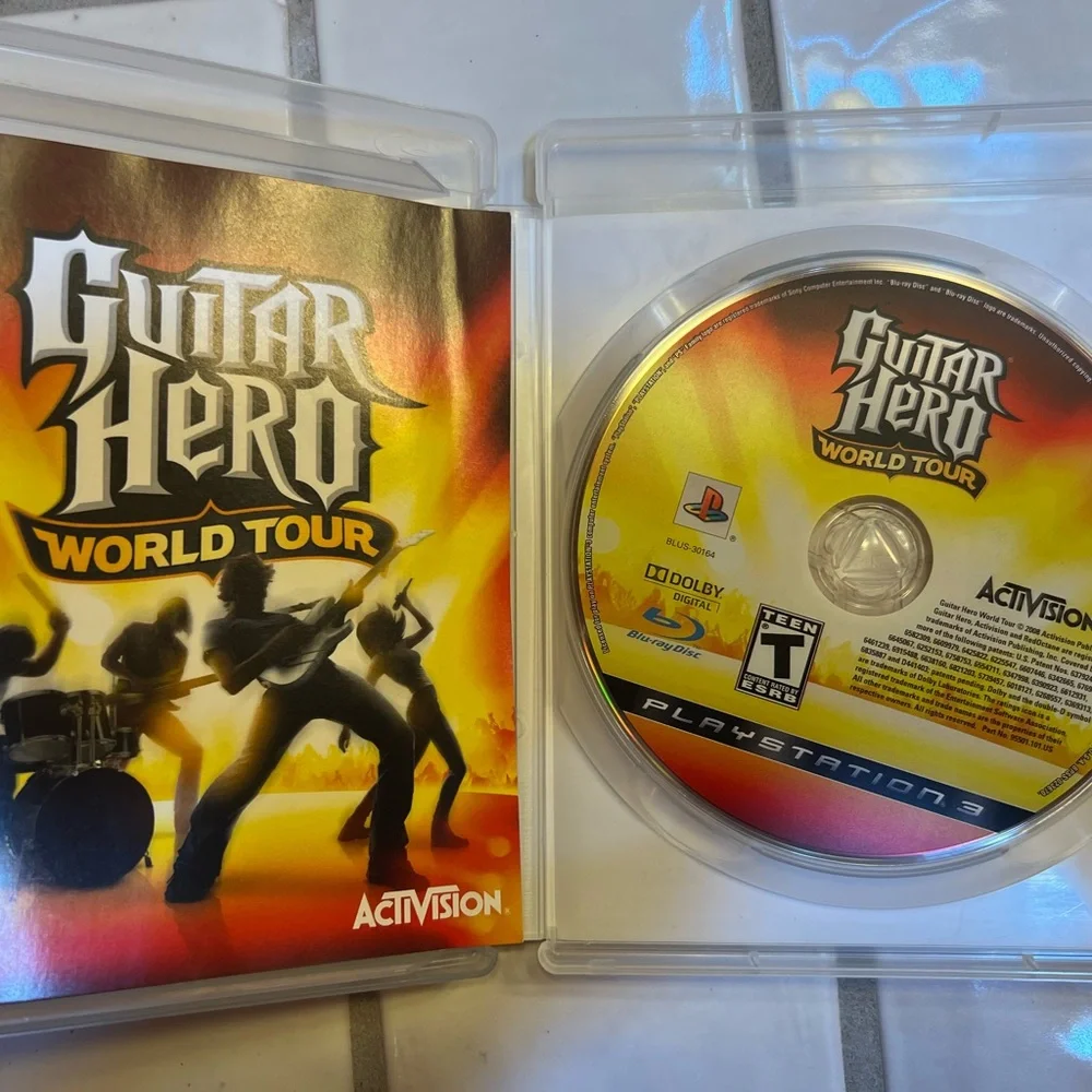 Sony Black guitar hero, and Disney sing it Video Games Collection